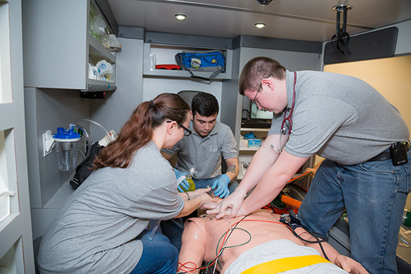 Students working in the Ambulance Simulator