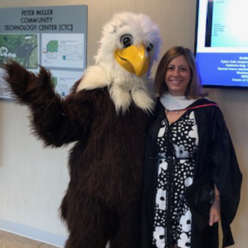 Nora with Spirit, the IVCC mascot